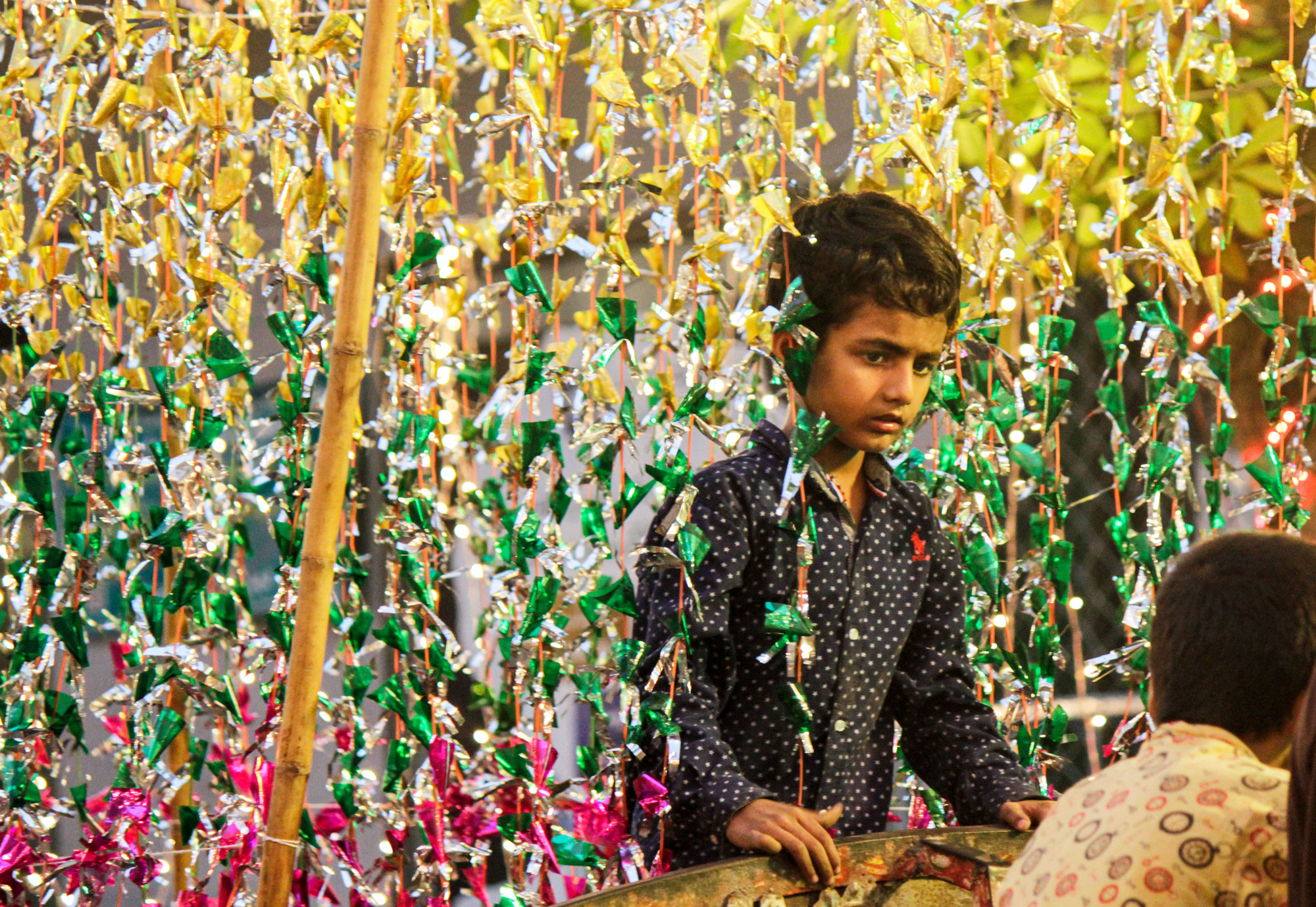 A kid in a decorated trolley